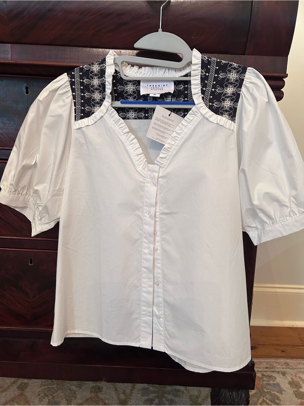 The Shirt by Rochelle Behrens White Puff Sleeve Blouse with Navy Embroidery